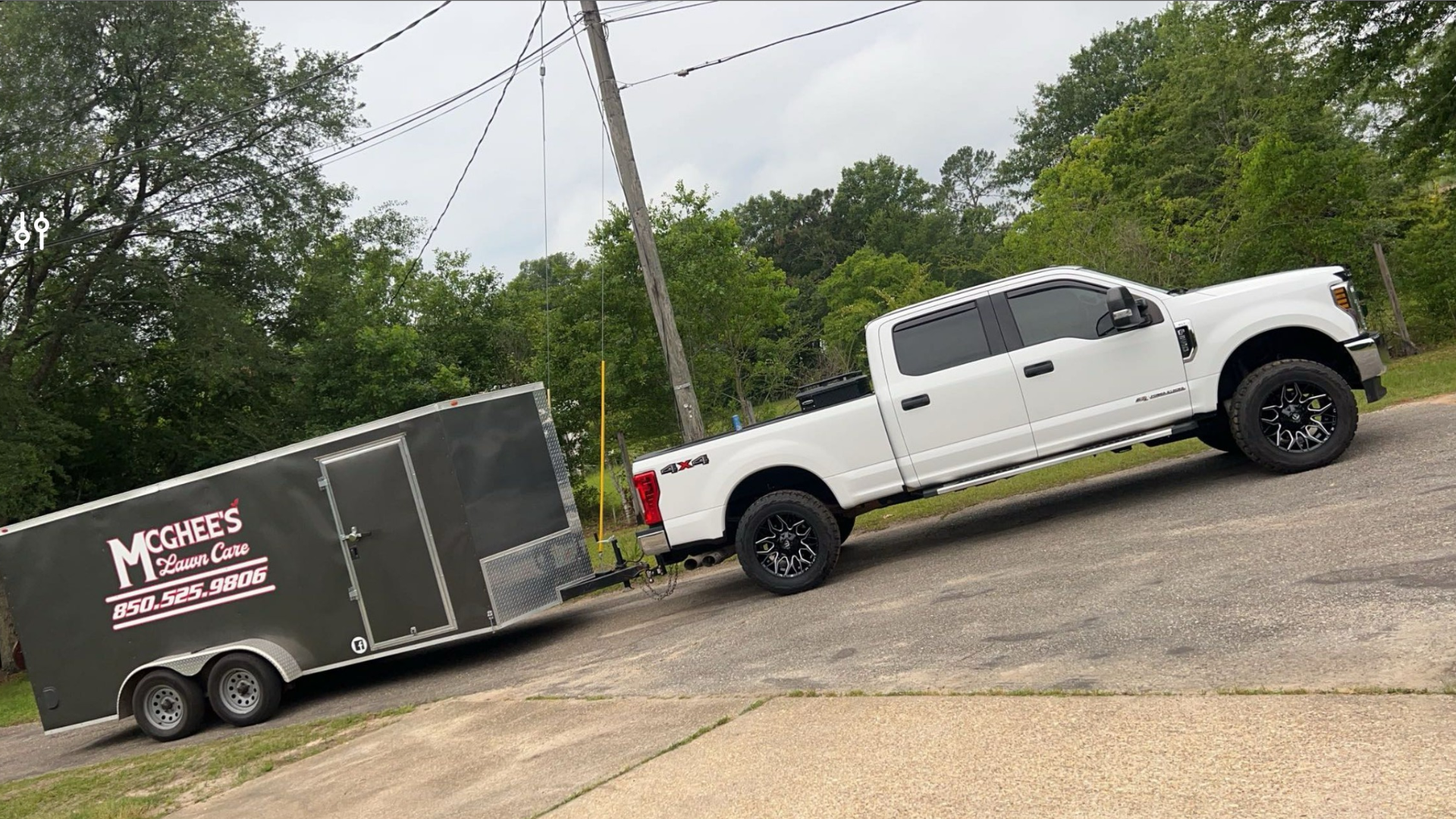 McGhee's Lawn Care truck and trailer in Pensacola, Florida